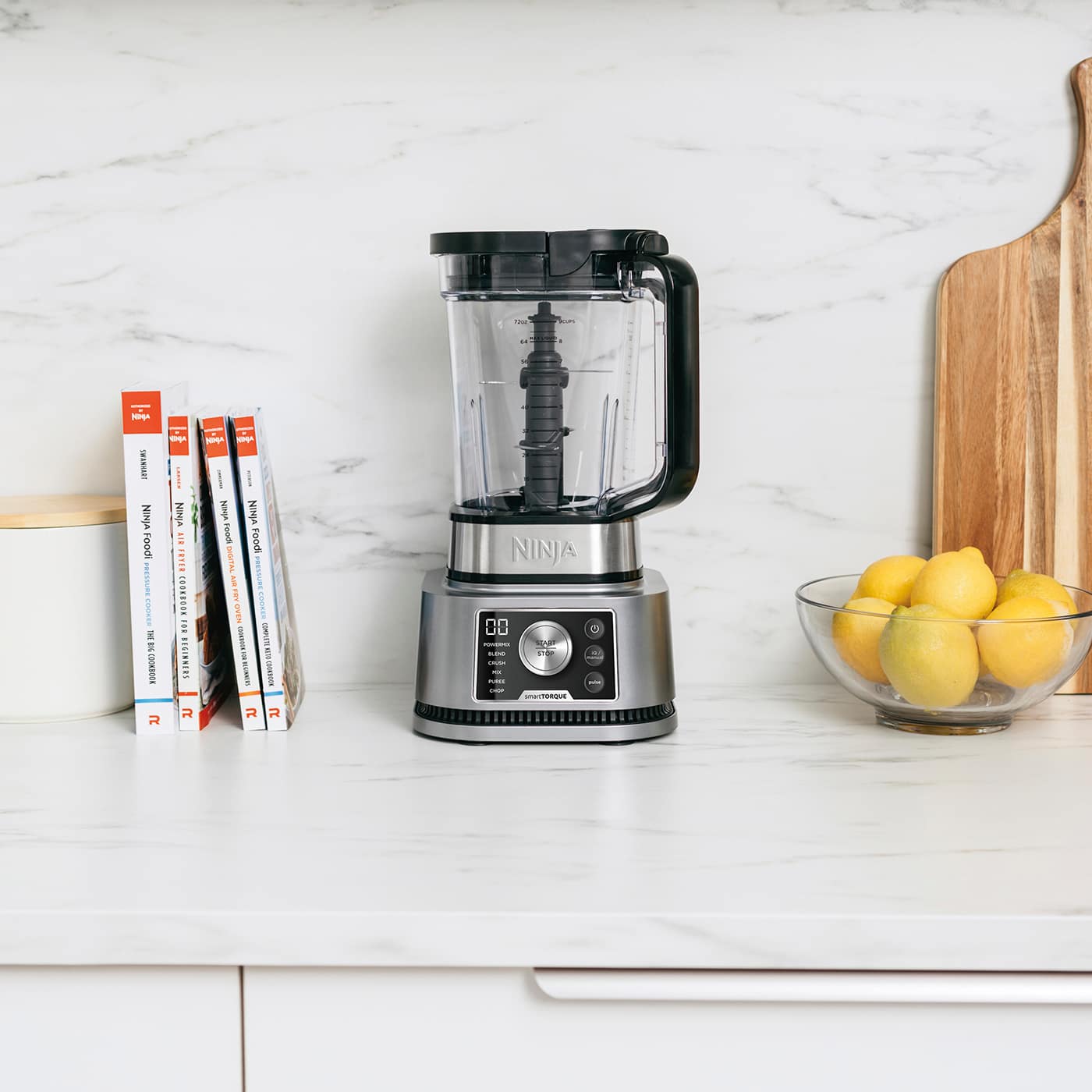 A Ninja blender on a kitchen counter top 